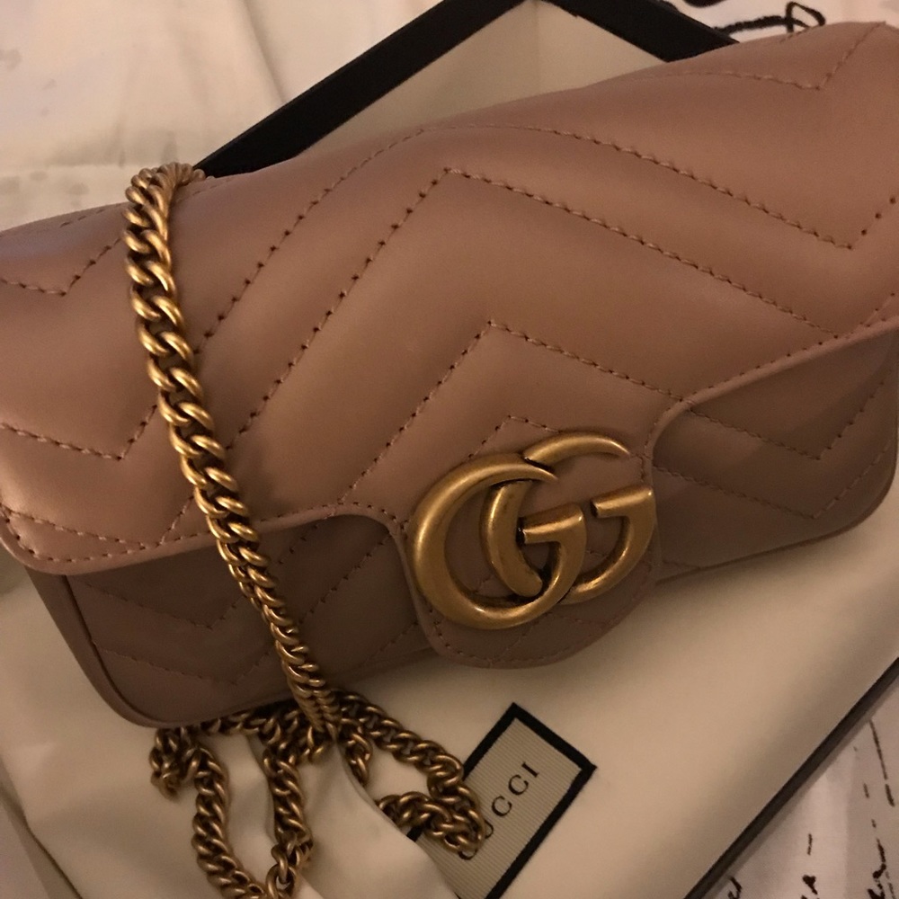 New never used Gucci super mini bag